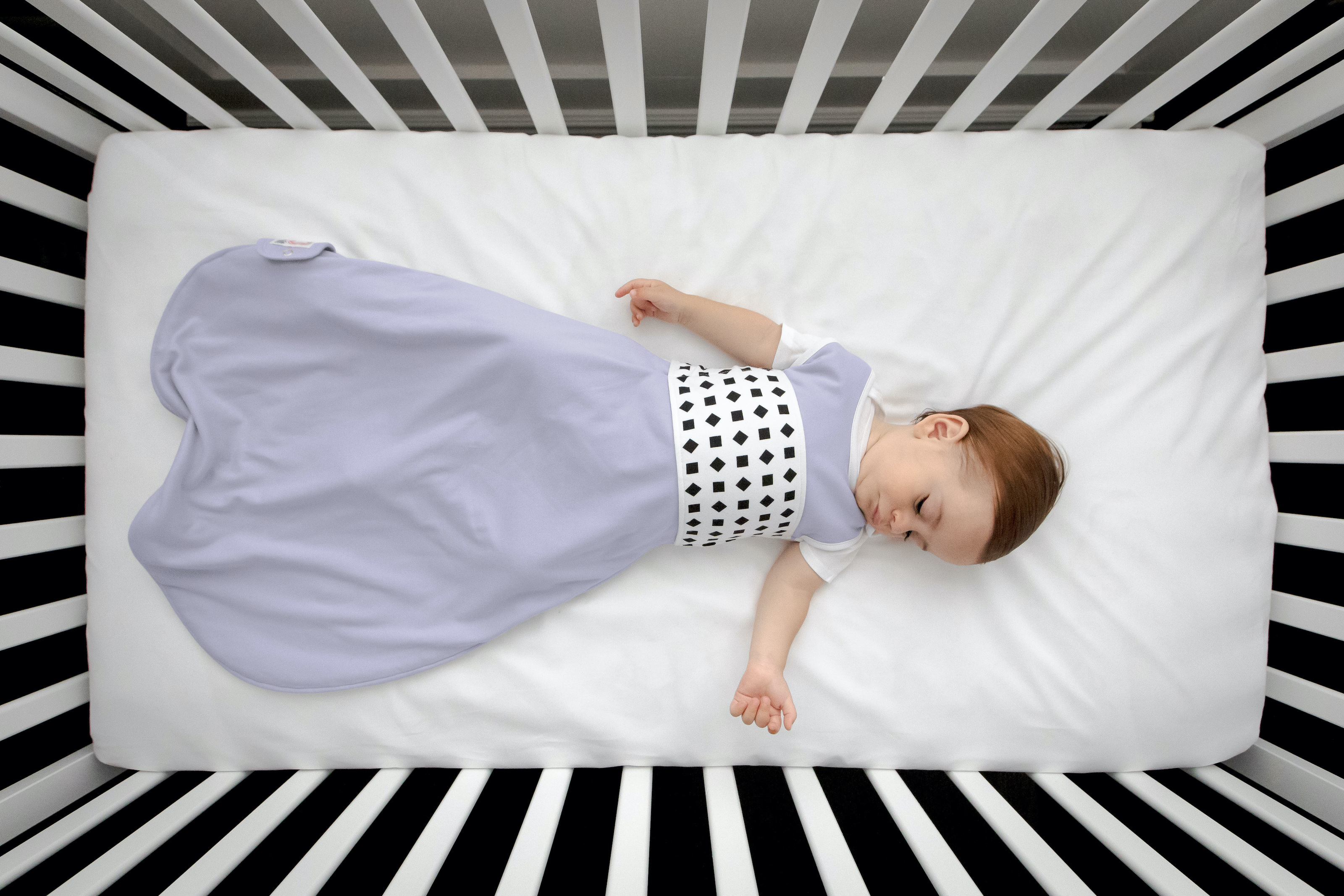 nanit breathing band over sleep sack